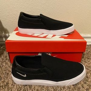 Black Nike Slip-ons